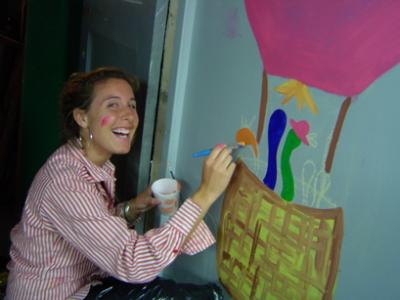 Andrea painting the worm room